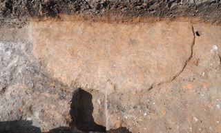 Archaeologists also discovered a 4-foot-wide (1.2 meters) circular hearth made of clay.