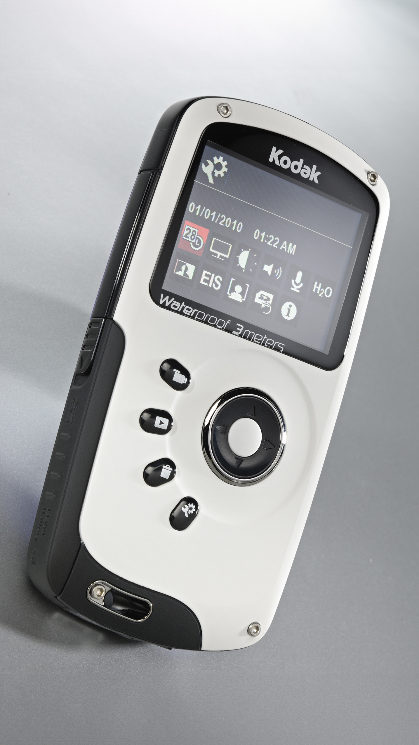 Kodak PlaySport Camcorder: Compact silver and black Kodak digital camera standing upright. Screen displays icons and date. Buttons below screen. Labeled waterproof to 3 meters