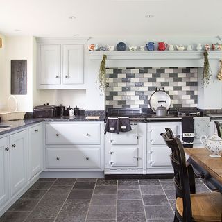 kitchen room with grey tiled flooring