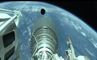 This view from the upper stage of a United Launch Alliance's Atlas V rocket shows the view after stage separation during the SBIRS GEO Flight 5 launch on May 18, 2021. The spent first stage can be seen in the background.