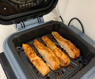 Salmon cooking in the Ninja Speedi Rapid Cooker and Air Fryer.