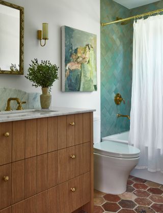 A bathroom with terracotta floor