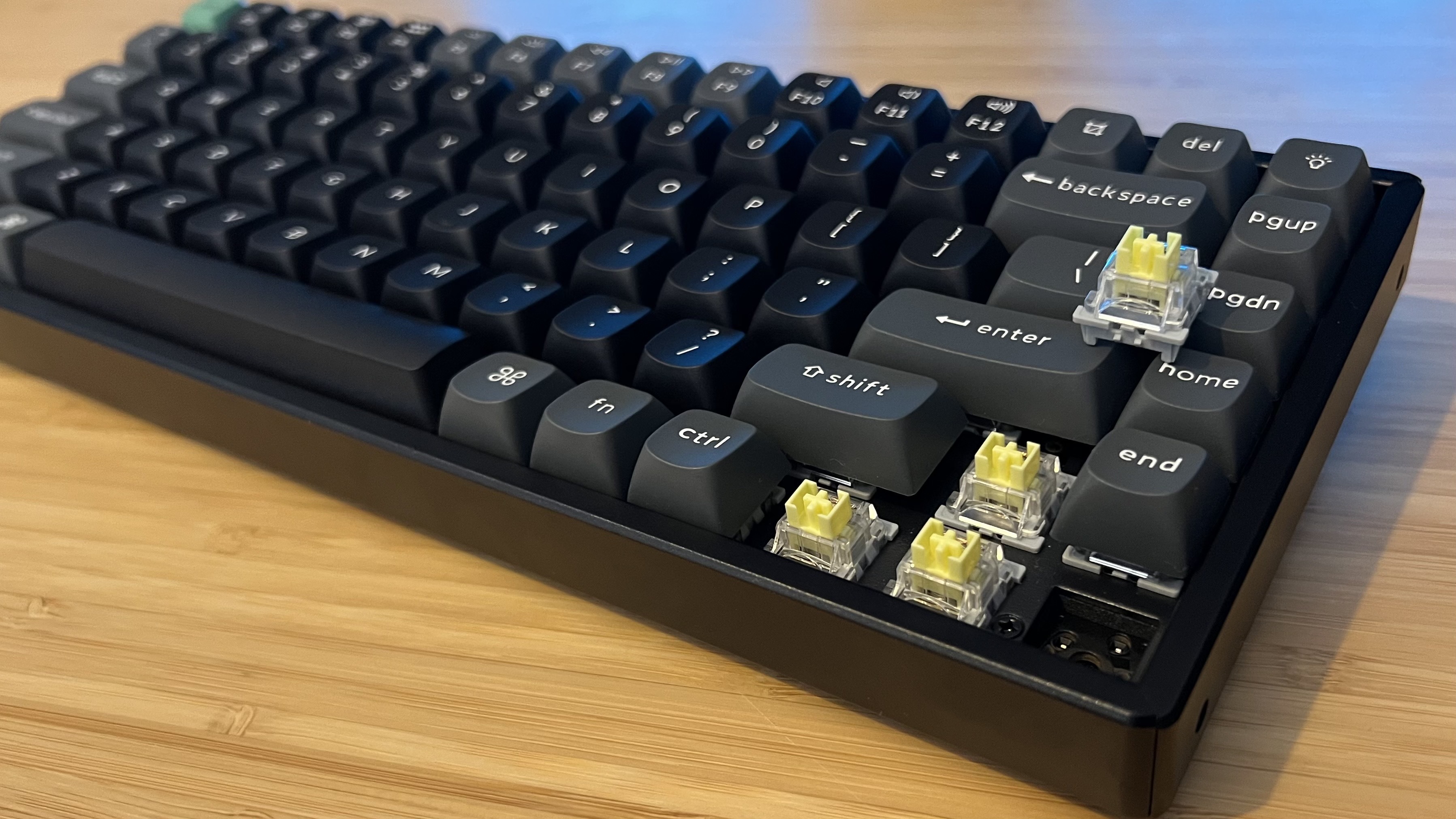 Keychron K2 Ultra 8K gaming keyboard with arrow caps and a switch removed