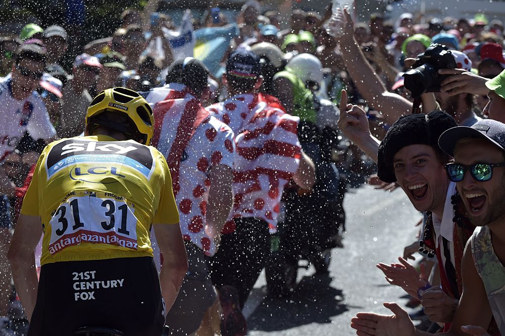 Team Sky's Chris Froome makes his way up the climb to La Pierre-Saint-Martin