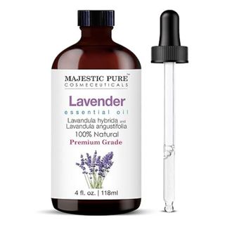 Glass bottle of lavender essential oil with pippette