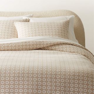 beige patterned bedding