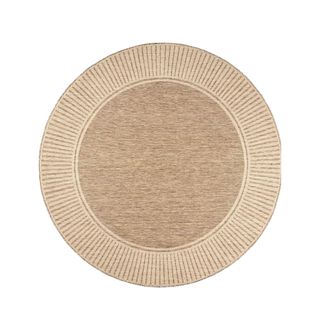 A brown circular area rug