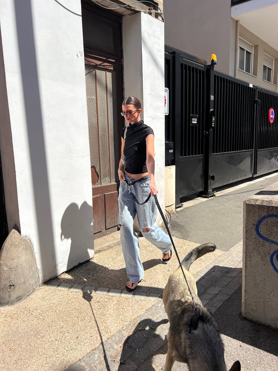 Laberiane Ponton in ripped jeans.