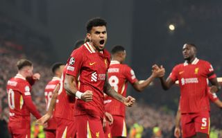 LIVERPOOL, ENGLAND - NOVEMBER 05: Luis Diaz of Liverpool celebrates scoring his team's first goal during the UEFA Champions League 2024/25 League Phase MD4 match between Liverpool FC and Bayer 04 Leverkusen at Anfield on November 05, 2024 in Liverpool, England. (Photo by Carl Recine/Getty Images)