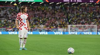 Luka Modric of Croatia prepares for a free kick during the FIFA World Cup Qatar 2022 quarter final match between Croatia and Brazil at Education City Stadium on December 9, 2022 in Al Rayyan, Qatar.