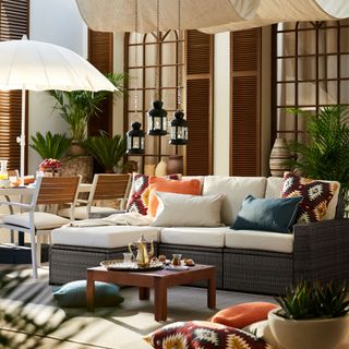 Outdoor space with luxury grey sofa and cushions