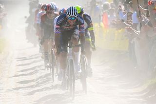 ROUBAIX FRANCE APRIL 17 Mathieu Van Der Poel of Netherlands and Team AlpecinFenix competes passing through a dusty cobblestones sector during the 119th ParisRoubaix 2022 Mens Elite a 2572km one day race from Compigne to Roubaix ParisRoubaix WorldTour on April 17 2022 in Roubaix France Photo by Bernard Papon PoolGetty Images