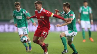 Union Berlin player Grischa Promel (centre)