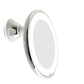 Silver makeup mirror with suctioned mount