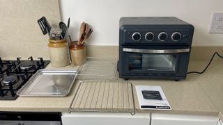 Cuisinart Air Fryer & Toaster Oven with all the component parts on the kitchen counter