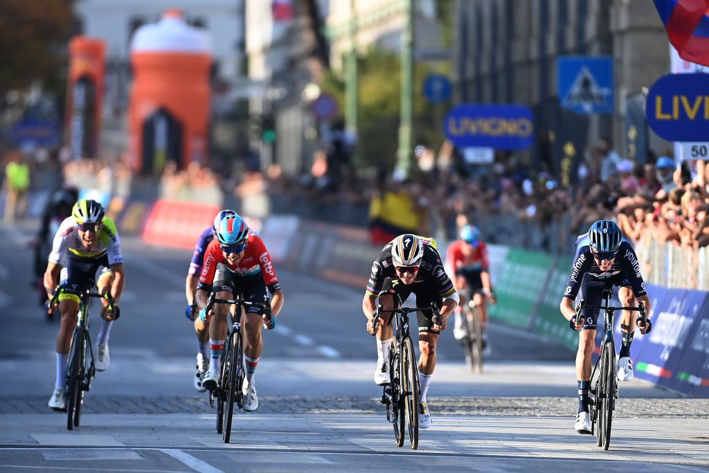 Andreas Kron (Lotto Dstny), Remco Evenepoel (Soudal-QuickStep) and Romain Bardet (dsm firmenich) sprint for ninth place