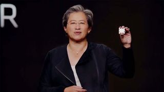 AMD CEO Dr. Lisa Su holding up a Ryzen 7000-series prototype during AMD&#039;s CES 2022 keynote