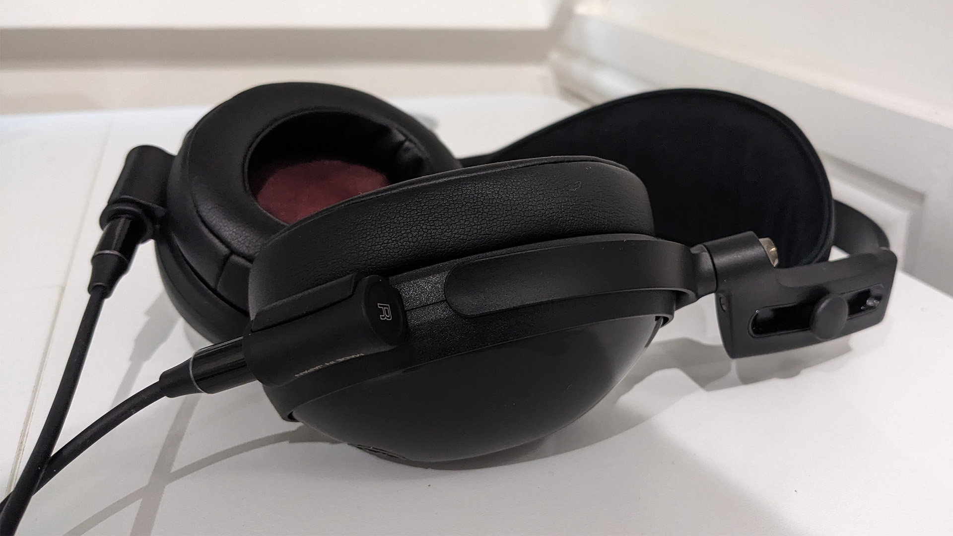 Yamaha YH-C3000 over-ear headphones on white surface
