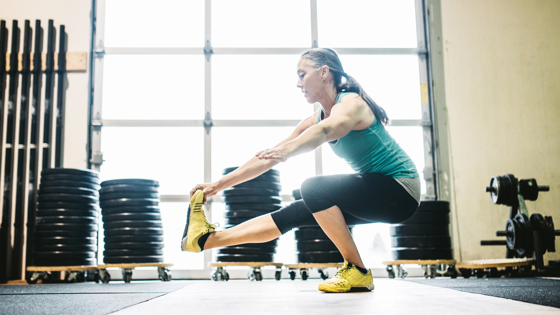 woman performing a pistol squat