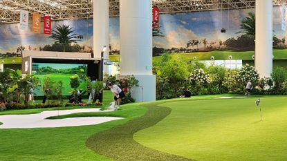 A golfer plays at the Golfzon City Golf in Tianjin, China.