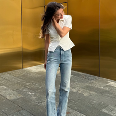 woman wearing jeans with pointed peep-toe heels 2025