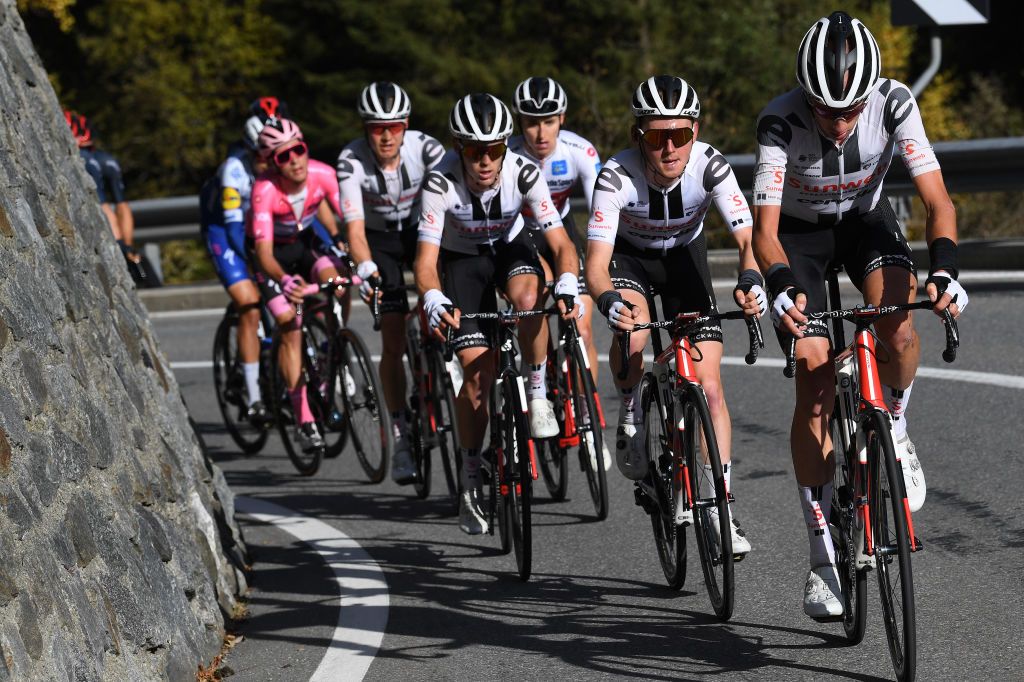 LAGHI DI CANCANO ITALY OCTOBER 22 Joao Almeida of Portugal and Team Deceuninck QuickStep Pink Leader Jersey Wilco Kelderman of The Netherlands and Team Sunweb Jai Hindley of Australia and Team Sunweb White Best Young Rider Jersey Chad Haga of The United States and Team Sunweb Sam Oomen of The Netherlands and Team Sunweb Martijn Tusveld of The Netherlands and Team Sunweb Peloton during the 103rd Giro dItalia 2020 Stage 18 a 207km stage from Pinzolo to Laghi di Cancano Parco Nazionale dello Stelvio 1945m girodiitalia Giro on October 22 2020 in Laghi di Cancano Italy Photo by Tim de WaeleGetty Images