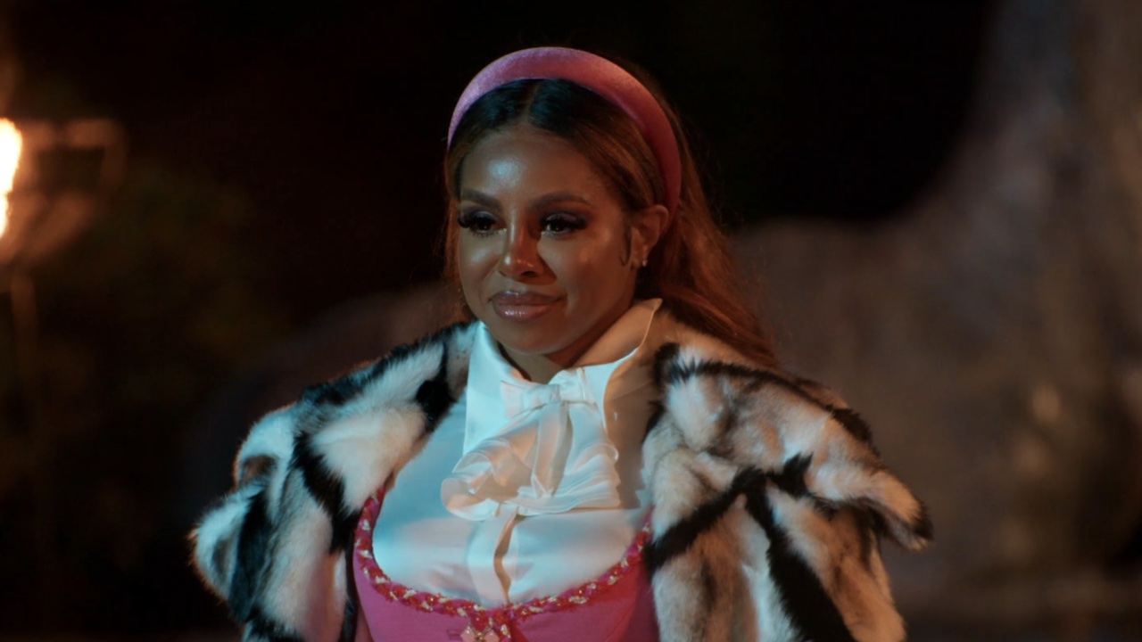 Candiace in front of Alan in Episode 1