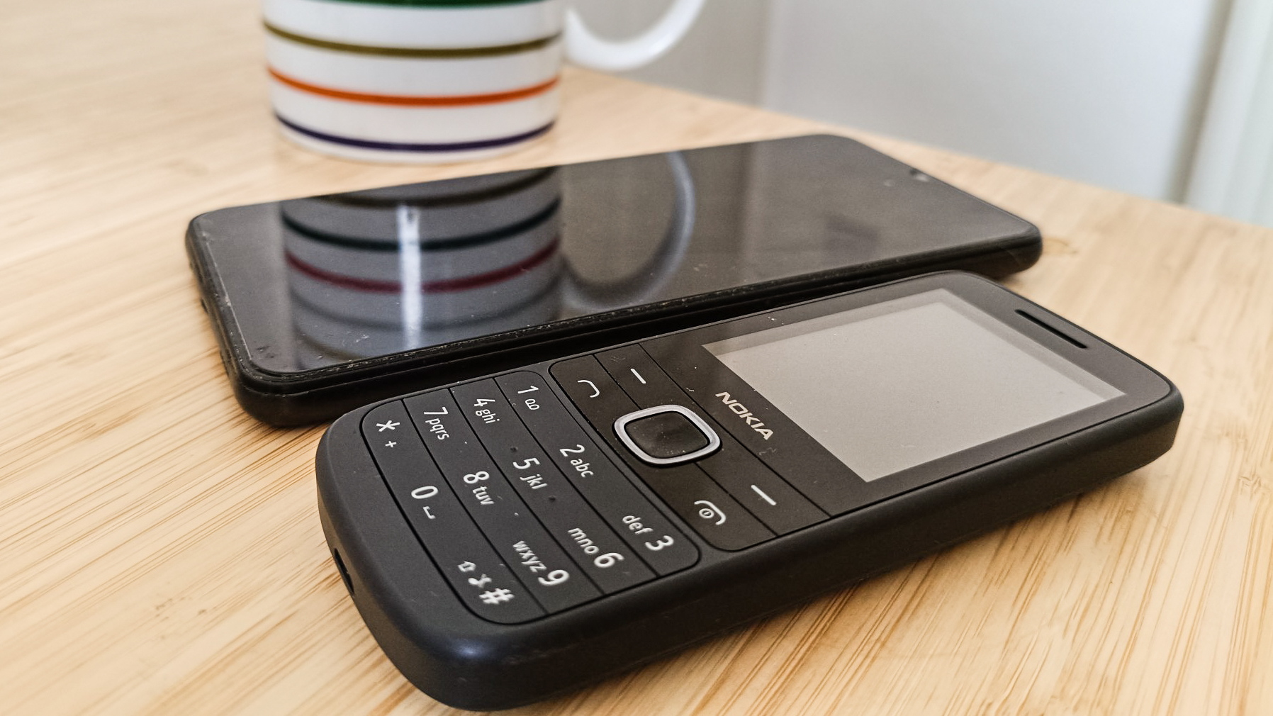 Two phones on a table