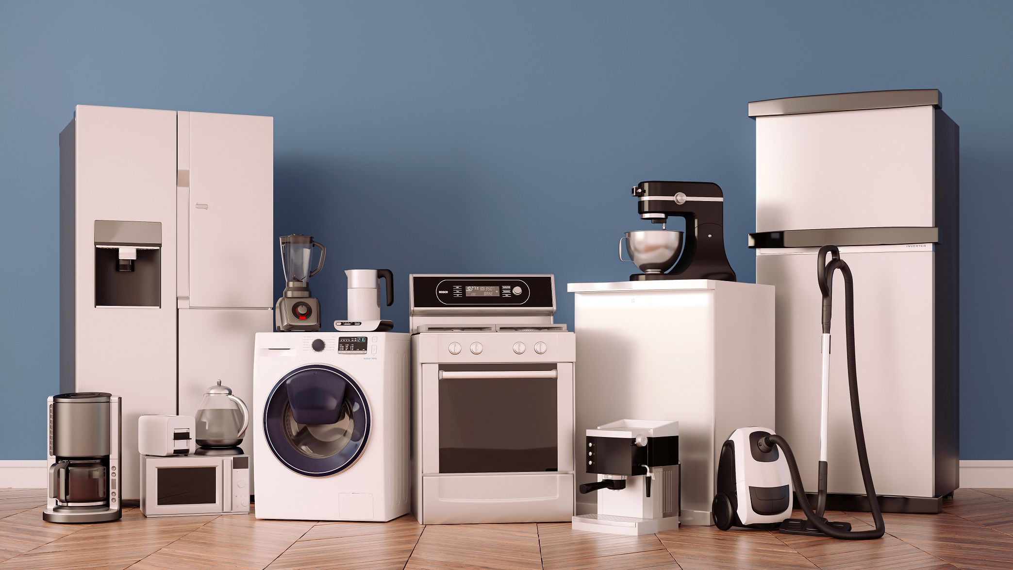 A selection of major and small kitchen appliances including a fridge, washing machine, vacuum and mixer