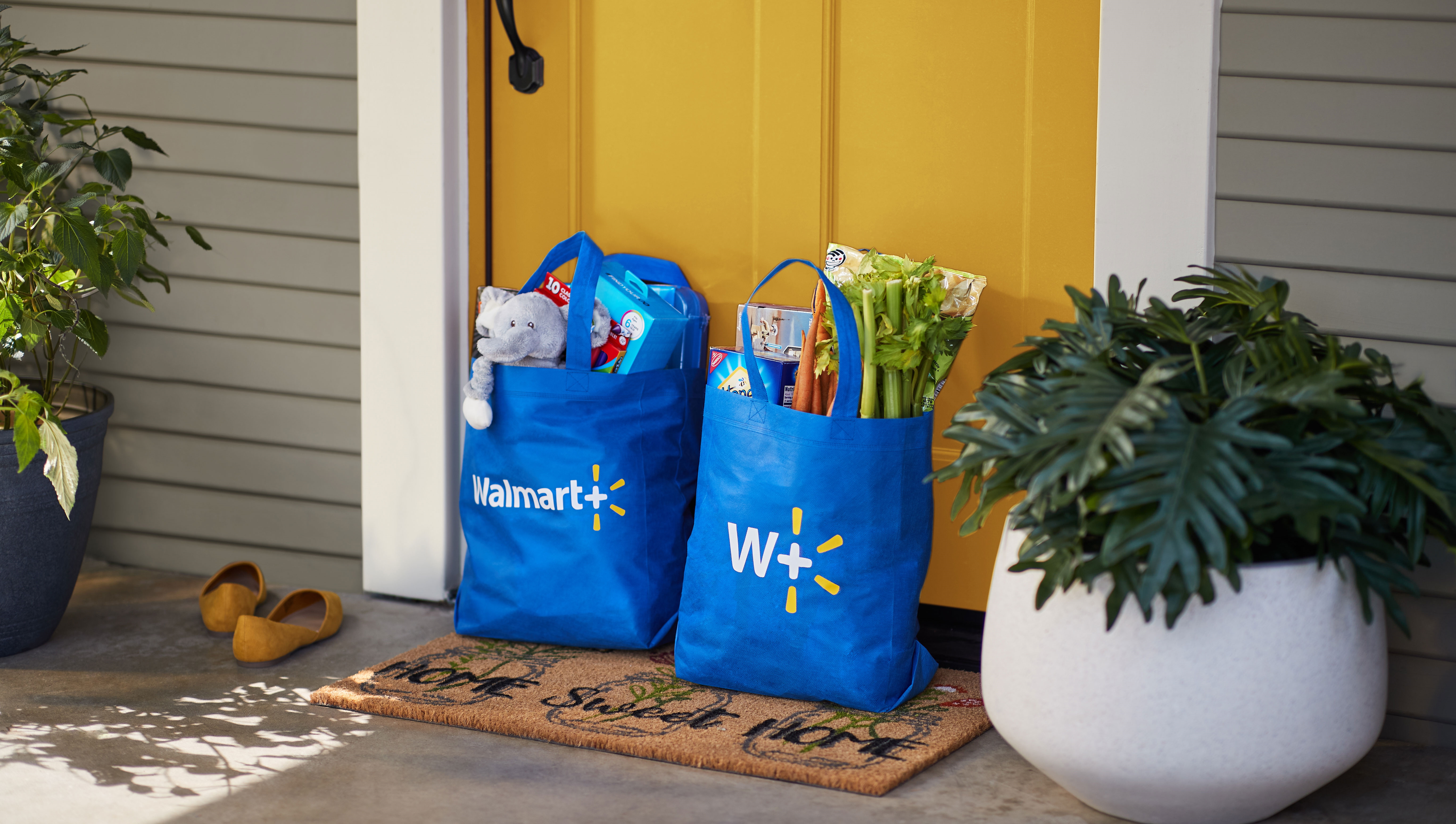 Walmart Plus shopping bags on a doorstep