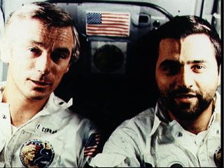 Candid photo of Apollo 17 astronauts Eugene Cernan and Harrison Schmitt aboard their spacecraft during their December 1973 lunar landing mission with command module pilot Ronald Evans.