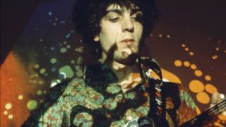 Singer Syd Barrett performing live onstage, playing Fender Esquire guitar, 1967