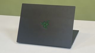A Razer Blade 14 (2025) on a desk with its lid facing the viewer