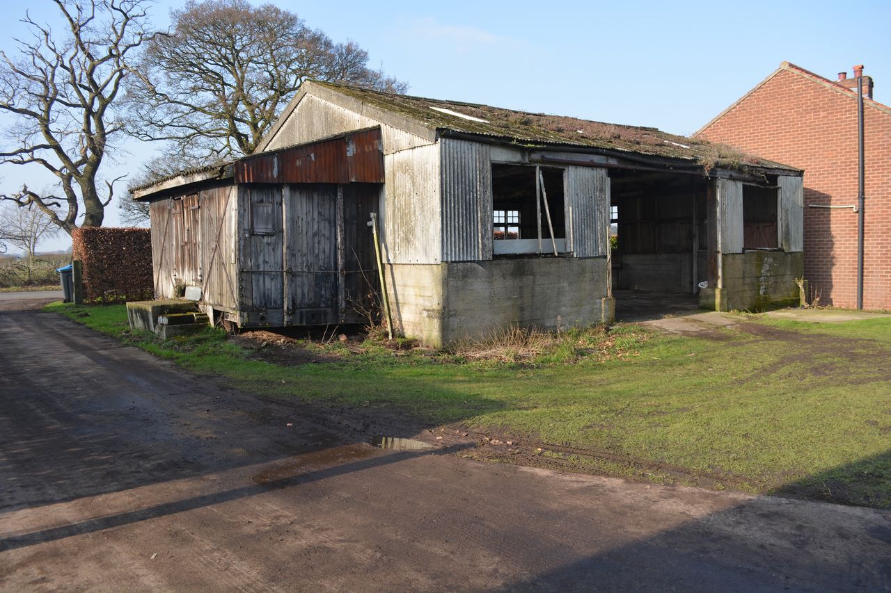 BEFORE: The original asbestos shed on site