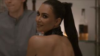 Kim Kardashian smiling in American Horror Story: Delicate