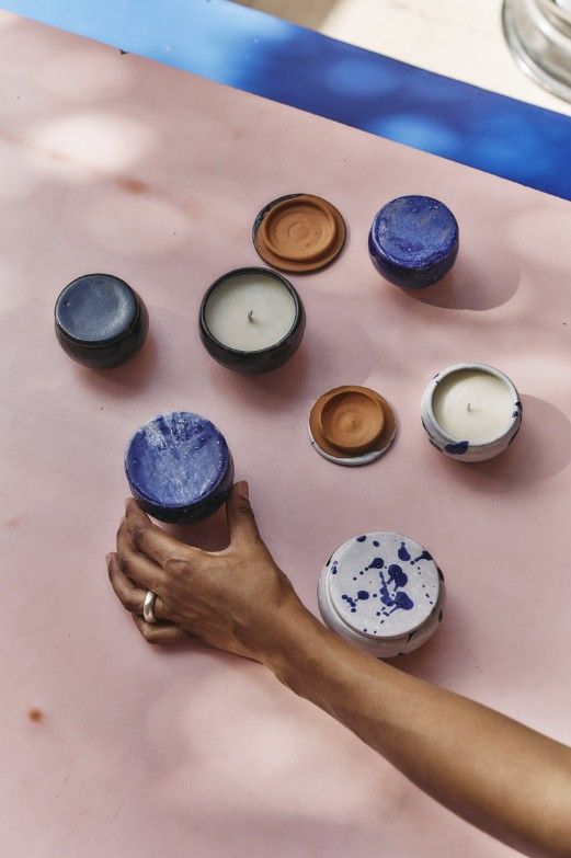 A colorful cafe and pottery workshop, captured in interior shots as well as lifestyle ones showing people engaging with its spaces and clay.