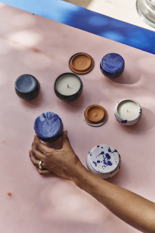 A colorful cafe and pottery workshop, captured in interior shots as well as lifestyle ones showing people engaging with its spaces and clay.