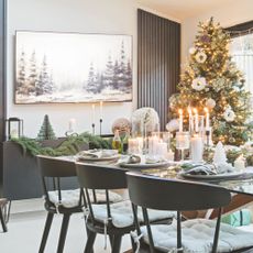 Decorated Christmas tree in dining room with tablescaping