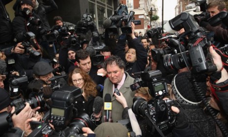 Julian Assange's lawyer, speaking to press outside the London court, says the accusations have been "trumped up."