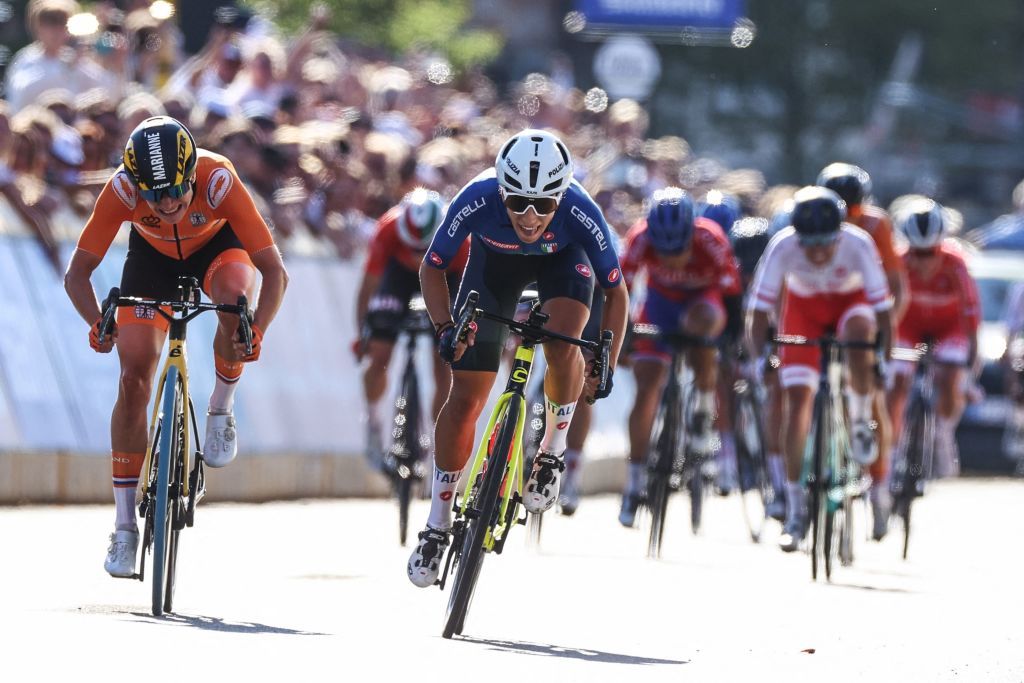 Italys Elisa Balsamo C sprints to the finish line to win ahead of Netherlands Marianne Vos L during the womens elite cycling road race 1577km from Antwerp to Leuven on the seventh day of the Flanders 2021 UCI Road World Championships on September 25 2021 in Leuven Photo by KENZO TRIBOUILLARD AFP Photo by KENZO TRIBOUILLARDAFP via Getty Images