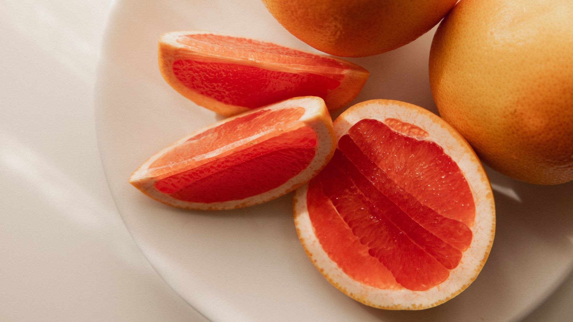 A grapefruit and some vitamins