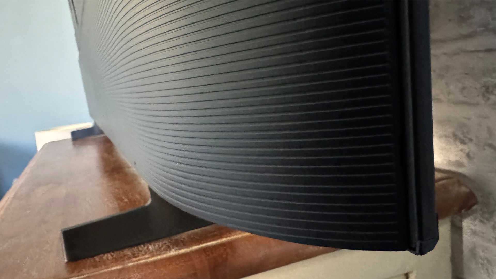 Samsung UE65U8000F 65-inch TV on wooden sideboard showing detail of rear of set