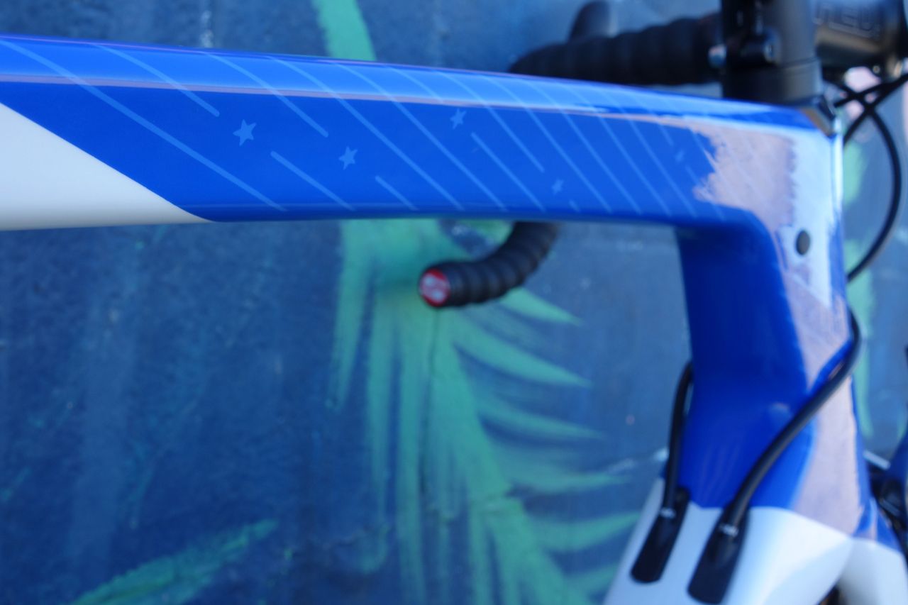 Subtle stars-and-stripes highlight the squared Podium top tube