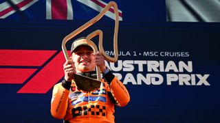 McLaren's Lando Norris celebrates winning the Austrian Grand Prix in 2025