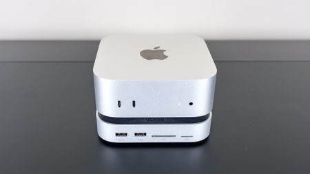 The Ugreen Mac Mini M4 Dock & Stand installed underneath a Mac mini M4 mini PC on a desk