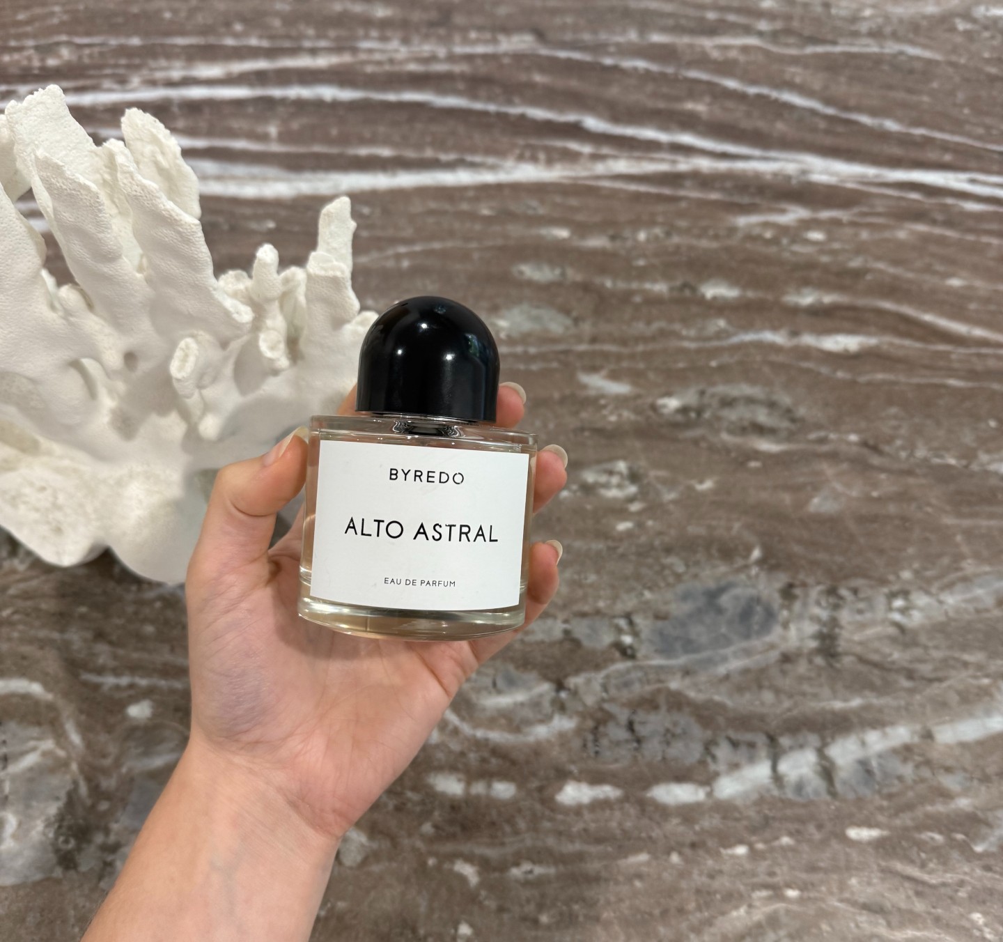 Jamie Schneider testing Byredo's Alto Astral perfume