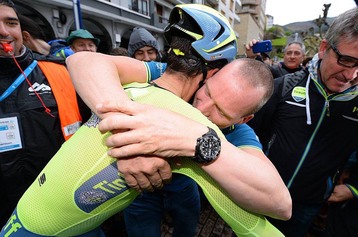 Alberto Contador (Tinkoff) embraces Lars Michaelsen after winning the time trial and race overall