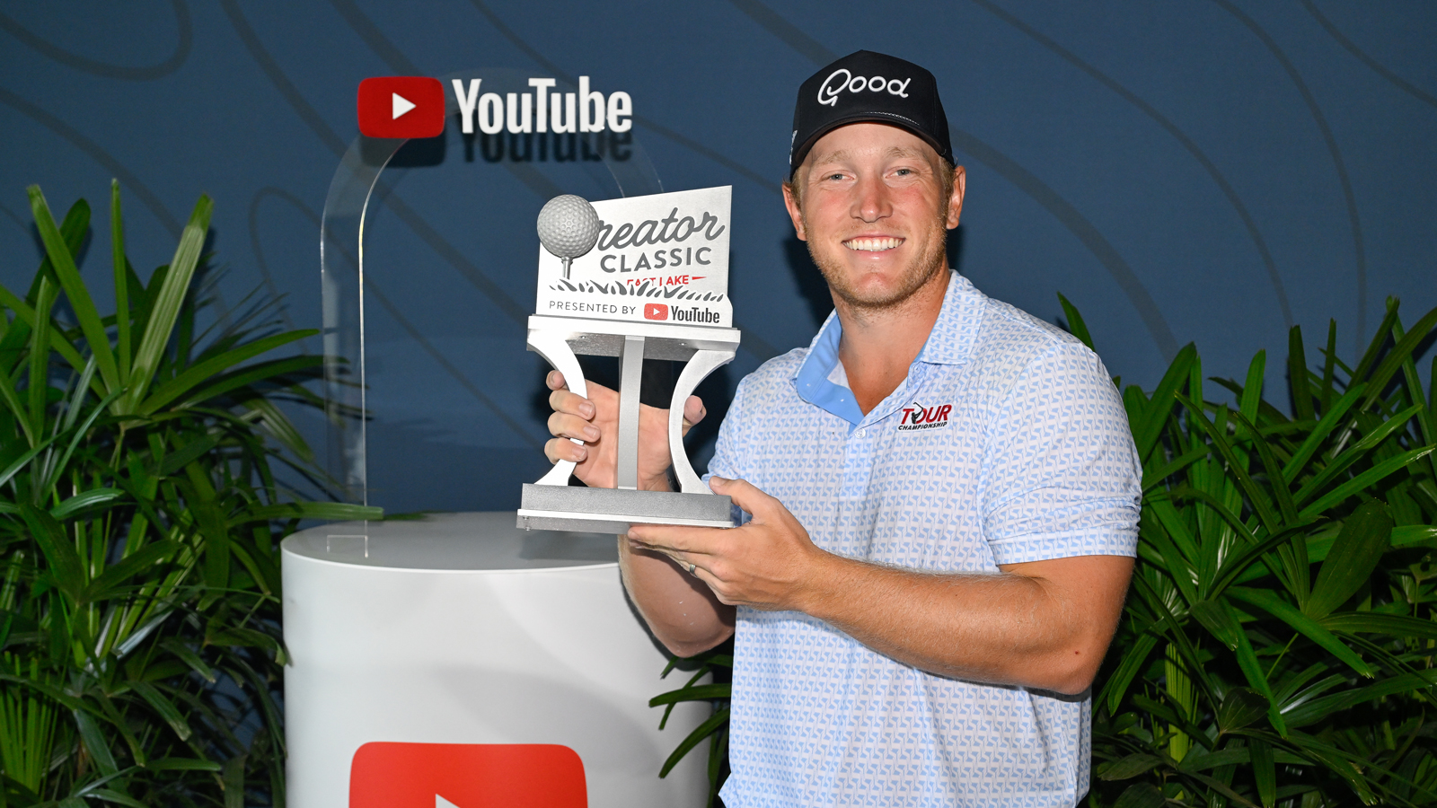 Brad Dalke holds a YouTube trophy