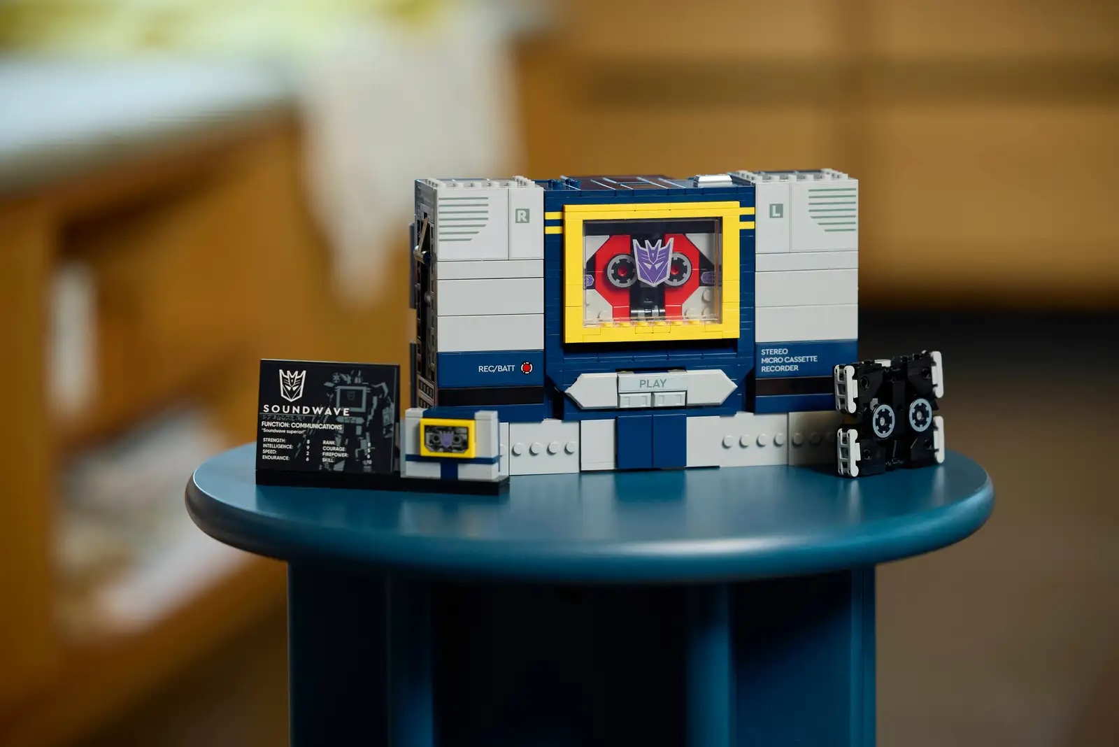 LEGO Transformers Soundwave transformed into a cassette player sat on a table 