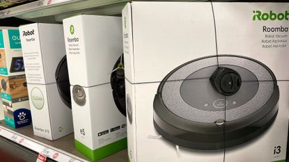 Robot vacuums on a shelf at a store